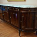 F14. French marble-top, four-drawer sideboard by Camard. 39"h x 98"w x 21"d 